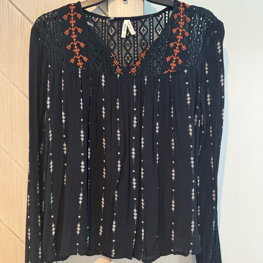 Black Blouse with Orange and White Accents